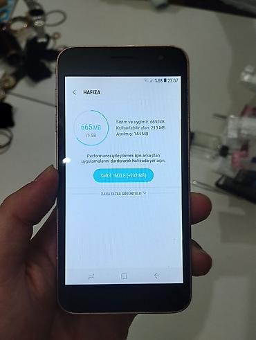 ses ucaldan: Samsung Galaxy J2 Core, 8 GB, rəng - Qızılı — 9