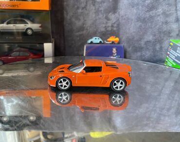 diski dlya avtomobilei: Коллекционная модель Opel Speedster orange 2000 DeAgostini Art 