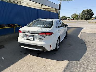 highlander 2017: Toyota Corolla: 2021 г., 1.8 л, Гибрид, Седан — 3