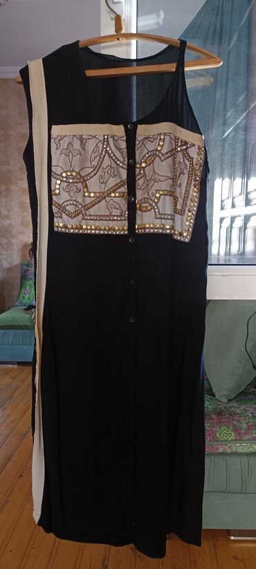 2 defe ad gunune geyilub Razmer S,M Ön hissəsində düymə bağlaması olan