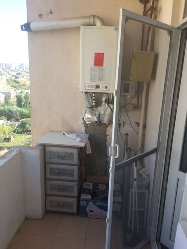 Uzunmüddətli kirayə mənzillər: İnşaatçilar metrosunun yaxınlığında bəyaz marketə yaxın 11 mertebeli — 14