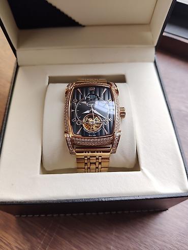 qol saati mexanika: Parmigiani Fleurier tərzində lüks qol saatı - Korpus: yastı (tonneau) — 3