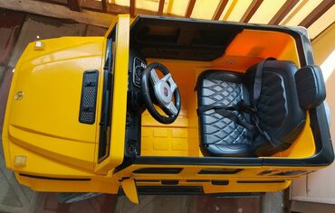 maşın ucun uşaq oturacağı: Mercedes-Benz G-Class modelinin sarı rəngli uşaq elektrik