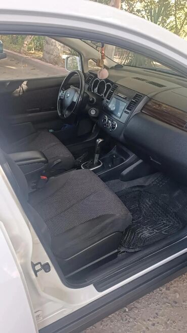 Nissan: Nissan Tiida: 1.8 l | 2011 il Sedan — 14