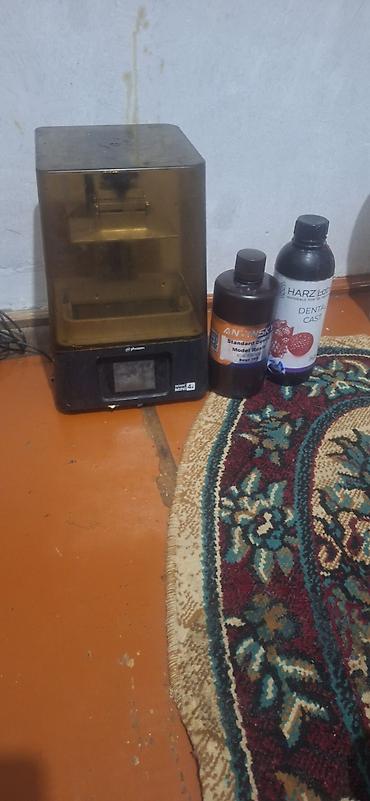 printer almaq: Kompüterdə hazırlanmış 3D modelləri rezindən çap edir. Diş — 2