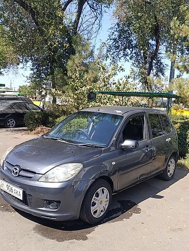 спинка: Mazda Demio: 2006 г., 1.3 л, Автомат, Бензин, Хэтчбэк — 1