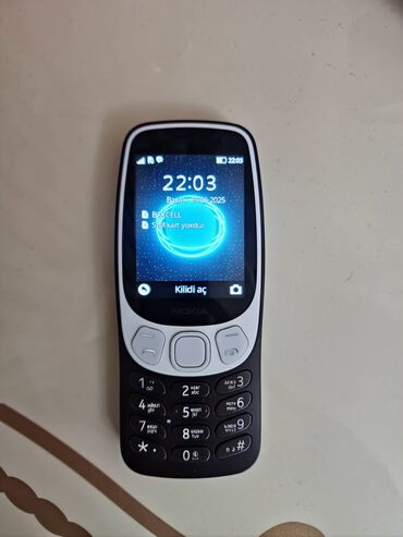 radiator islenmis: Nokia 3310, 128 ГБ, цвет - Черный, Кнопочный