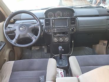 Транспорт: Nissan X-Trail: 2 л | 2004 г. Универсал — 5