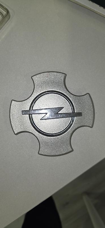 opel korsa: Opel təkər mərkəz qapağı (emblem) - Rəng: gümüşü, xrom detallı loqo - — 1