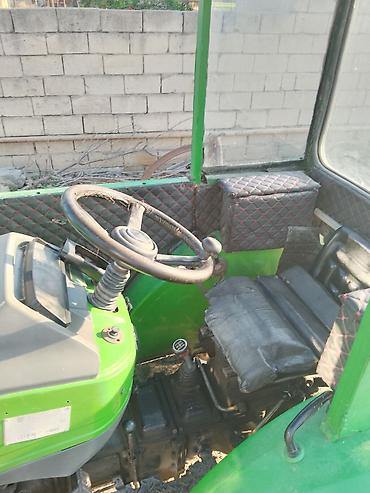 qoşqu yeri: Yaşıl rəngli mini traktor, kabinli. - Dizel mühərrik (suyutmalı) — 4