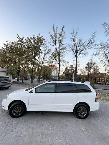 марк таета: Toyota Corolla: 2002 г., Бензин, Универсал — 5
