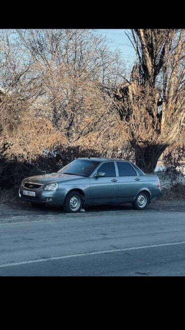 сколько стоят зимние шины на машину: Автомобиль Lada Priora серого цвета. Это компактный седан, подходящий