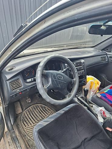 e klass: Toyota Carina E: 1995 г., 1.8 л, Механика, Бензин, Хэтчбэк — 9