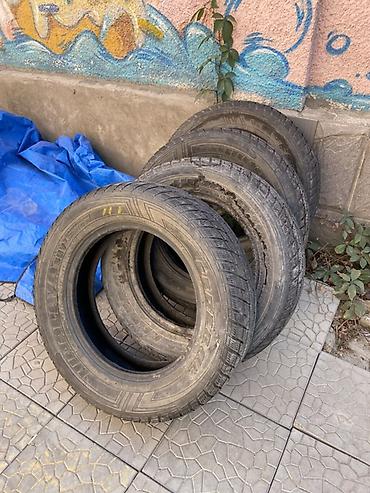 952 2: Комплект шин (4 шт.) - Модель: Dunlop Grandtrek SJ6 (надпись — 2