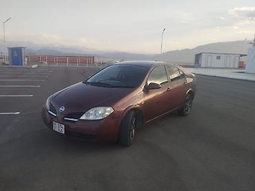 kia ev: Nissan Primera: 2002 г., 1.8 л, Механика, Газ, Лифтбек — 1