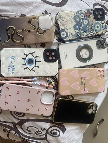 iphone 5s telefon: Məhsul: iPhone 11 Pro Max ve iphone 15 üçün telefon qabları . her biri — 1