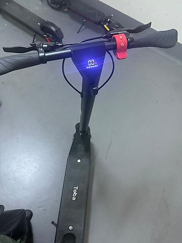 elektrikli scooter toba: Elektrikli skuter – Toba - Rəng: qara, yığcam və minimal dizayn - — 7