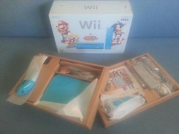 Nintendo Wii: 🎮 Nintendo Wii konzola – komplet + 64GB + 50 igara Prodajem Nintendo — 5