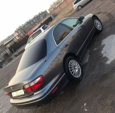 Mazda: Mazda Millenia: 1997 г., 2.5 л, Механика, Бензин, Седан