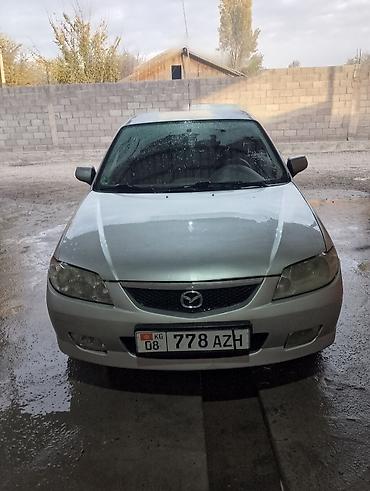 х5 м: Mazda Familia: 2001 г., Бензин, Универсал — 7