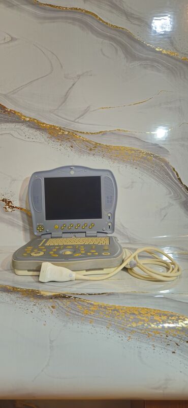 Нитриловые перчатки: GE Logiq BOOK portativ ultrasəs aparatı - Brend/model: GE Logiq Book