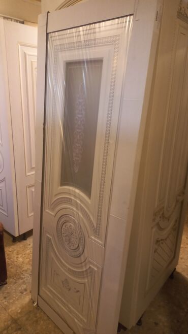 Otaq qapıları: Ağ rəngdə, klassik üslubda qapı. Panellərlə işlənmiş dizaynı otağa -da lalafo.az — 9 Otaq qapıları: Ağ rəngdə, klassik üslubda qapı. Panellərlə işlənmiş dizaynı otağa — 9