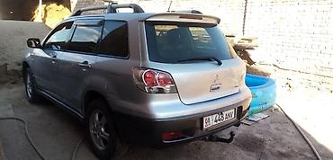 кводроцикл мото: Mitsubishi Outlander: 2003 г., 2.4 л, Автомат, Бензин, Кроссовер — 1