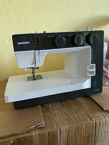 прамой строчка: Швейная машина Janome, Механическая, Автомат — 1