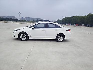 golf 1: Toyota Corolla: 2021 г., 1.8 л, Гибрид, Седан — 6