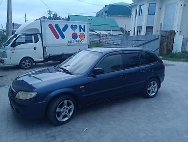 пороги демио: Mazda Familia: 2002 г., Механика, Универсал — 1