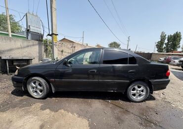 опель вектра б: Продается седан Toyota Avensis черного цвета. Автомобиль оснащен