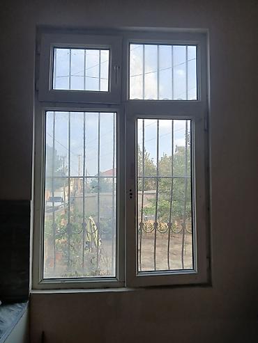 pencere kilidi: PVC pəncərə bloku - Material: Ağ PVC profil - Konfiqurasiya: 4 — 2