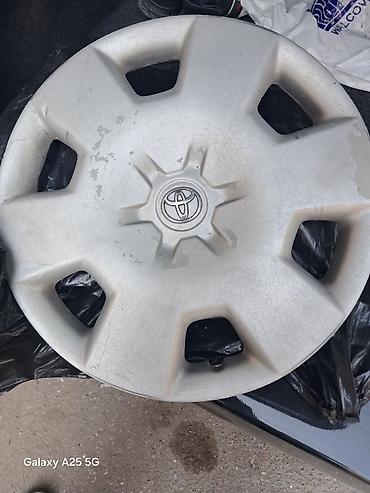 toyota diskləri: Toyota orijinal təkər qalpoku R14 3 eded di 1 ededi 10 man 

- — 1
