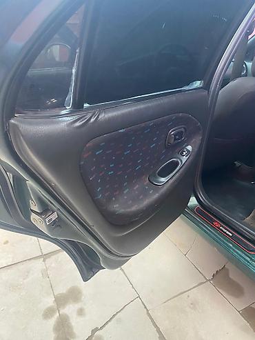 Hyundai: Hyundai Elantra: 1.6 l | 1997 il Universal — 18