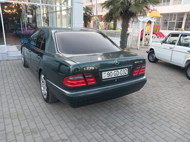 qosqu lapet satisi: Mercedes-Benz E 230: 2.3 l | 1997 il Sedan