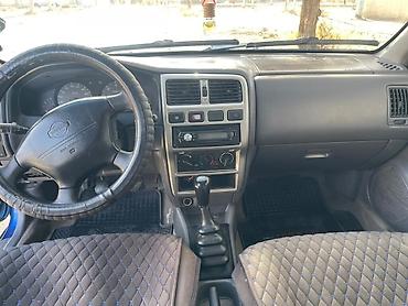 bmw 318: Nissan Almera: 1998 г., 1.4 л, Механика, Бензин, Седан — 7