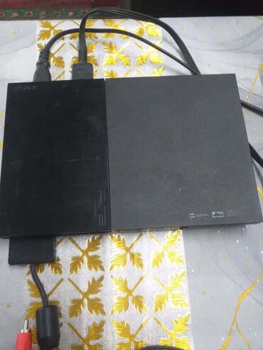 ps2 fat: Sony PlayStation 2 Slim oyun konsolu üzərində görülən hər şey verilir