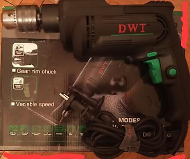 direl: DWT SBMP08-13 zərbəli matkap – 810W Xüsusiyyətlər: - Güc: 810 W - 2 — 1