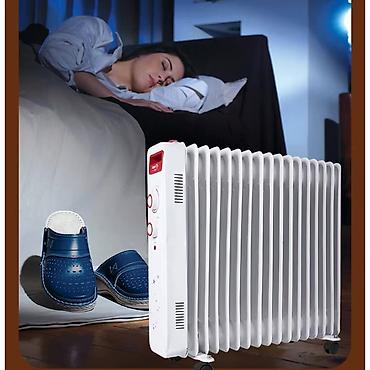 Масляные обогреватели: Масляный обогреватель Кол-во секций: 7, Быстрый нагрев, Встроенный вентилятор, Несколько режимов мощности — 2