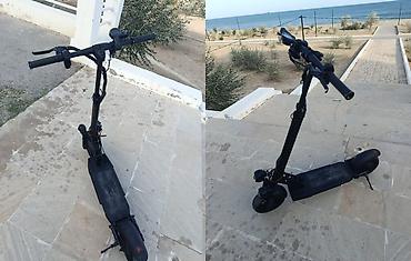 elektrikli scooter tap az: Skuter 150 kq göturür 2ilin Zavod 50 sürrətdi 120 kq nan 35-40 sürrət — 1