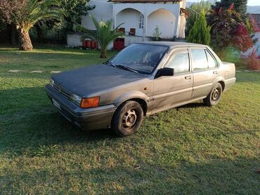 Nissan Sunny: 1.4 l. | 1990 έ. Λιμουζίνα