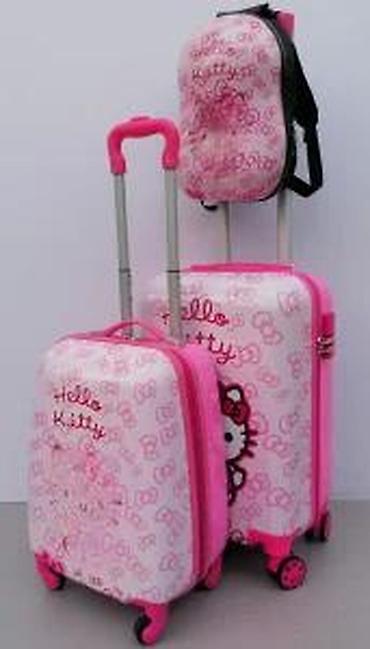 Rančevi, torbe i koferi: Pink kofer za decu sa motivom Hello Kitty, idealan za putovanja. Kofer — 24