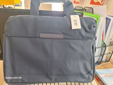 спец одежда бу: Продаю сумку для ноутбука . Размер 39×29. 
Новая, цена 900сом