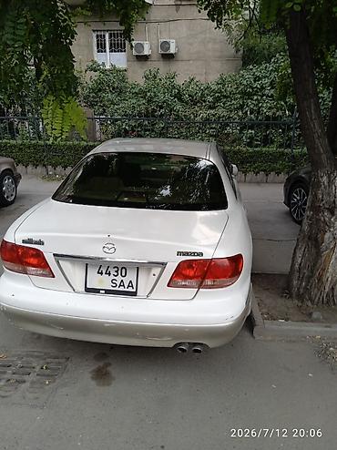 жена: Mazda Millenia: 2001 г., 2 л, Автомат, Бензин, Седан — 2