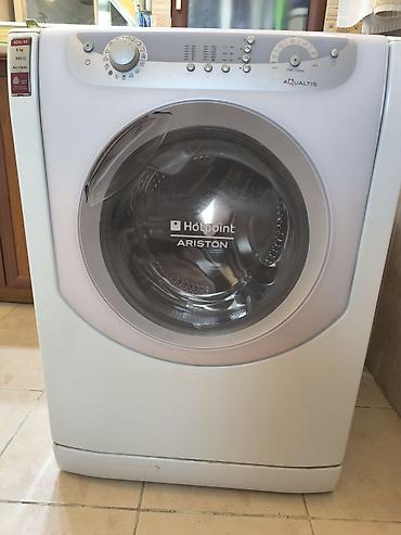 Бытовая техника: Стиральная машина Hotpoint-Ariston Aqualtis AQXL 85 - Фронтальная — 4