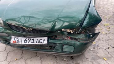 машинаны: Mazda Capella: 1998 г., 1.8 л, Механика, Газ, Седан