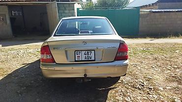 Mazda: Mazda 323: 1998 г., Механика, Бензин, Седан — 4