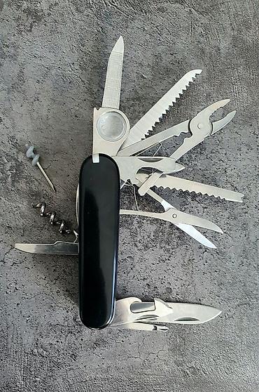 мултитул: Мультитул Victorinox (черные накладки) новый Компактный швейцарский — 2
