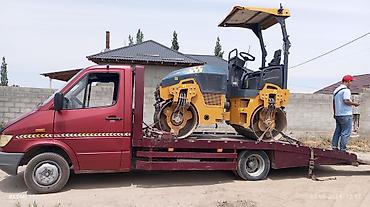 tow truck: С ломаной платформой, С частичной погрузкой — 7