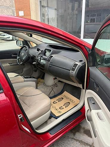 bmw e 39: Toyota Prius (2-ci nəsil) hibrid hetçbek - Rəng: qırmızı gövdə — 1
